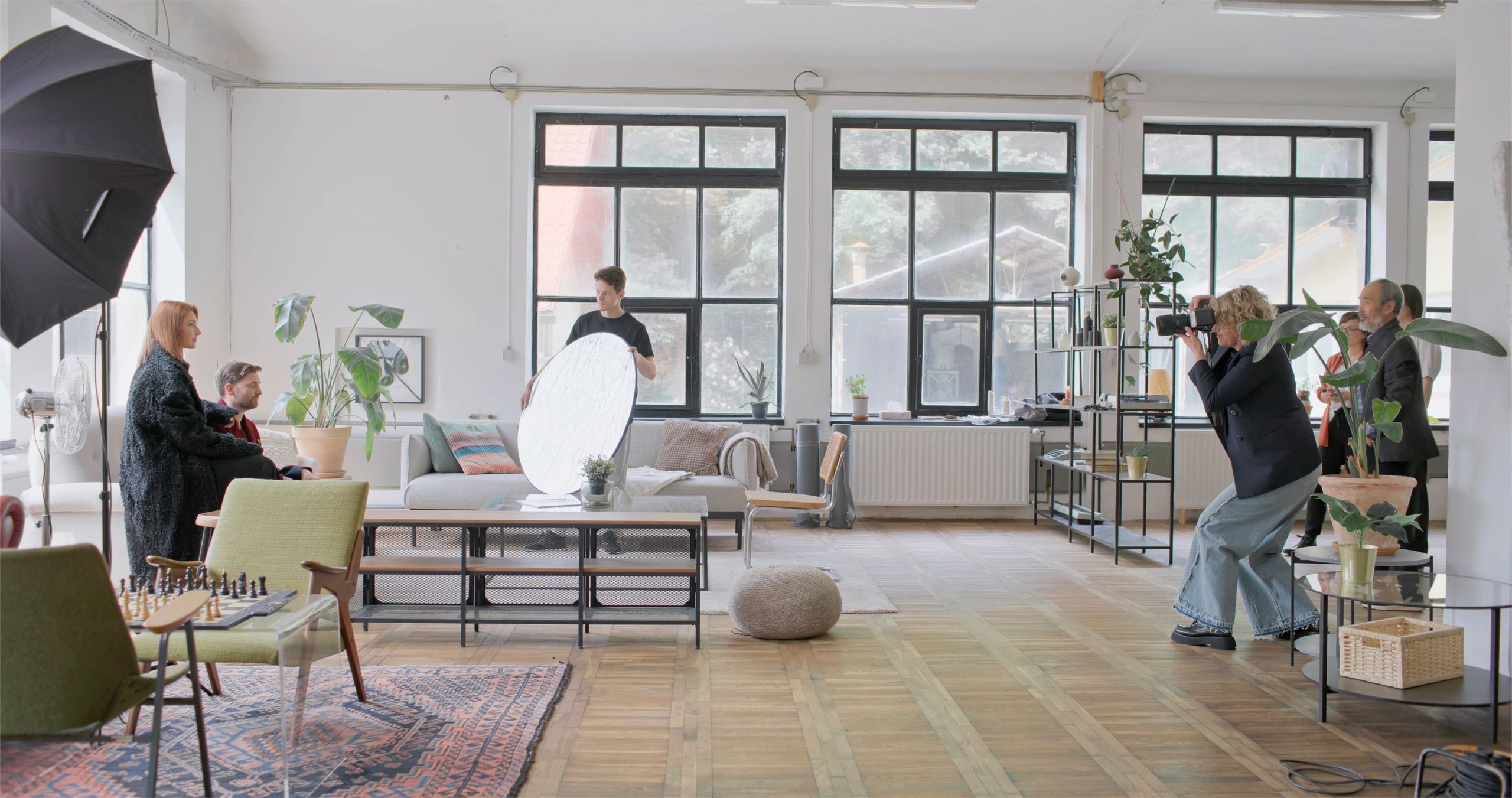 Production team on a bright studio set